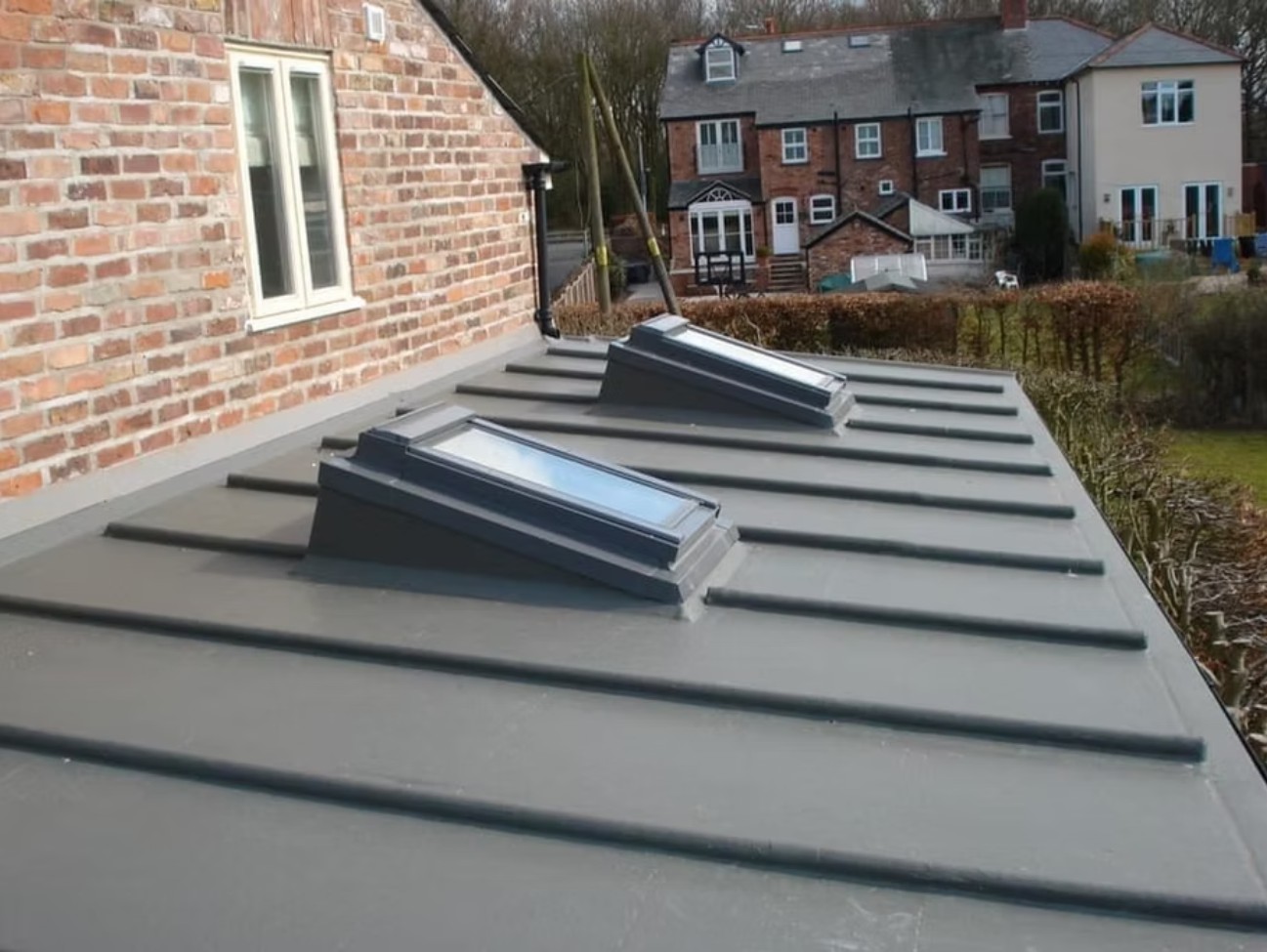 Completed flat roof with roof windows